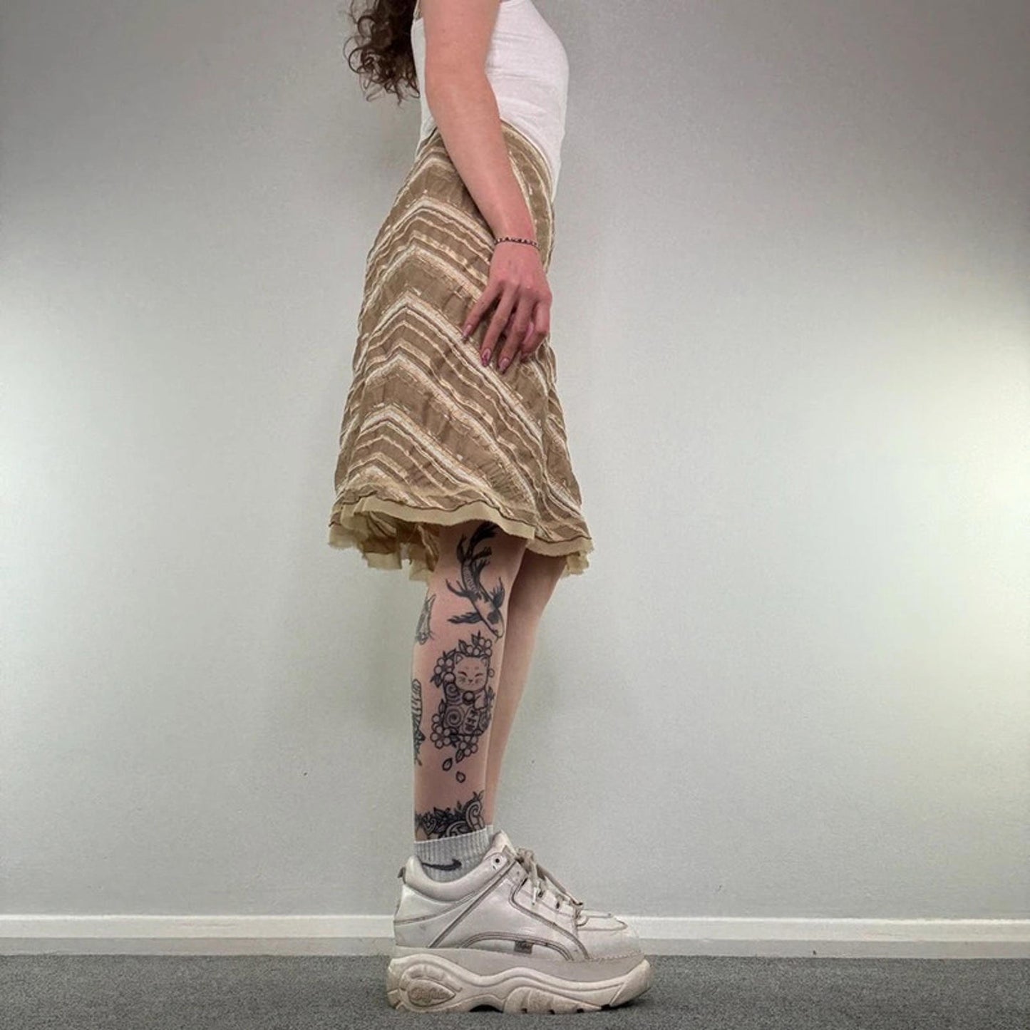 Y2K vintage striped midi skirt gold knee length fraying hem diagonal stripe