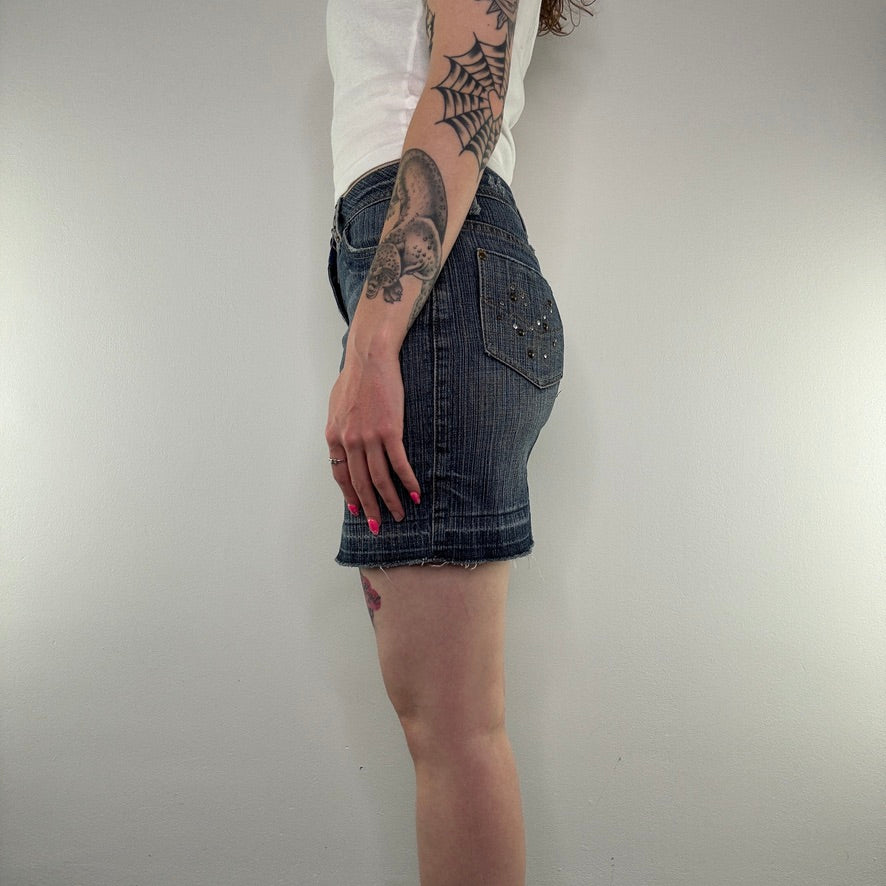 Y2K studded faded denim mini skirt