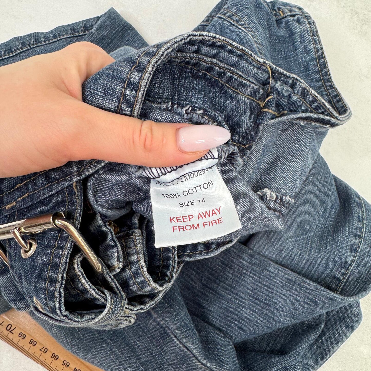 Y2K vintage bootcut denim jeans buckle belt faded blue wash ripped distressed