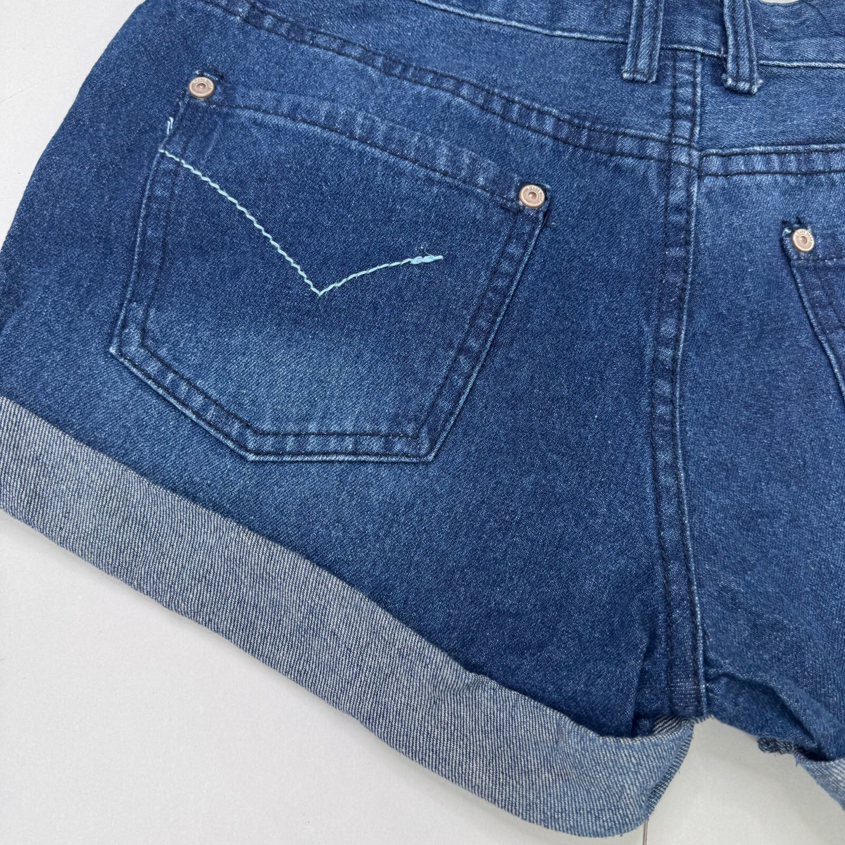 Y2K vintage denim mini shorts distressed dark blue turned up