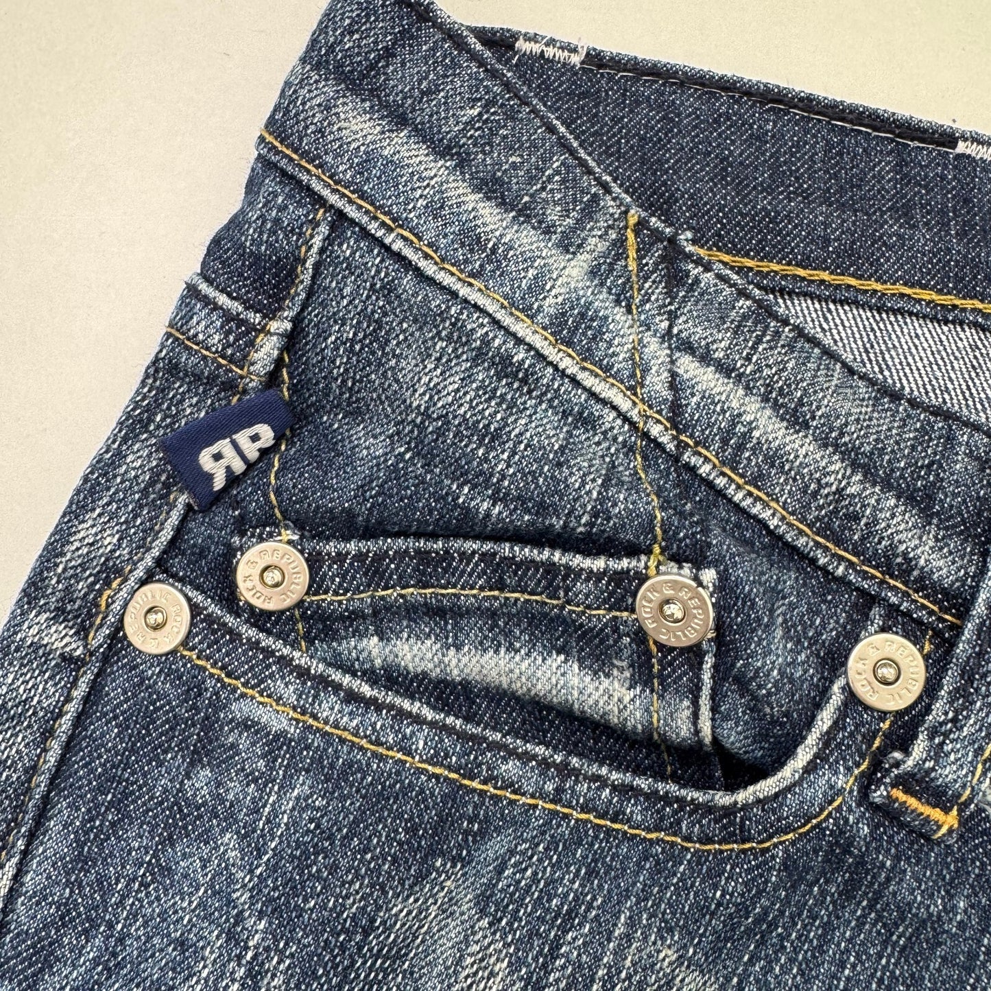 Y2K vintage Victoria Beckham bootcut denim jeans red crown faded low rise