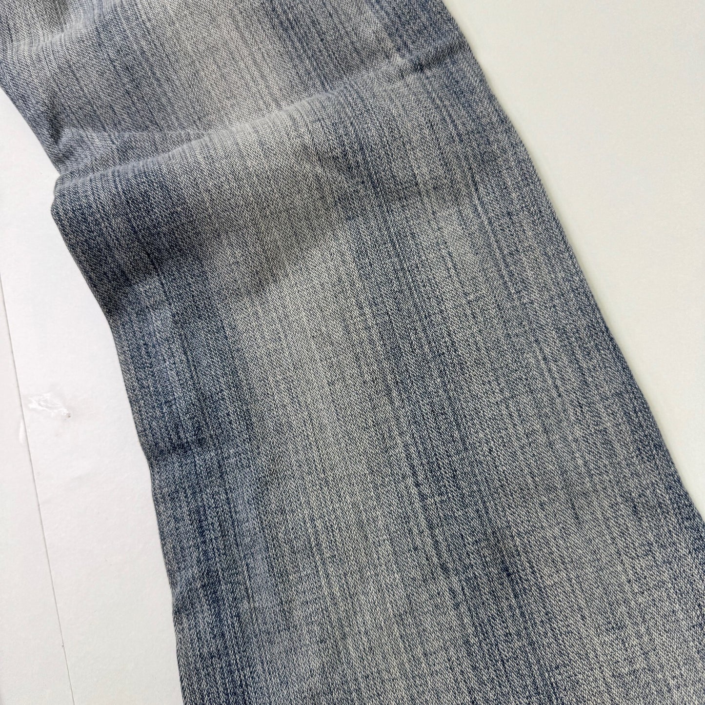 Y2K vintage low rise bootcut denim jeans faded distressed stripe wash