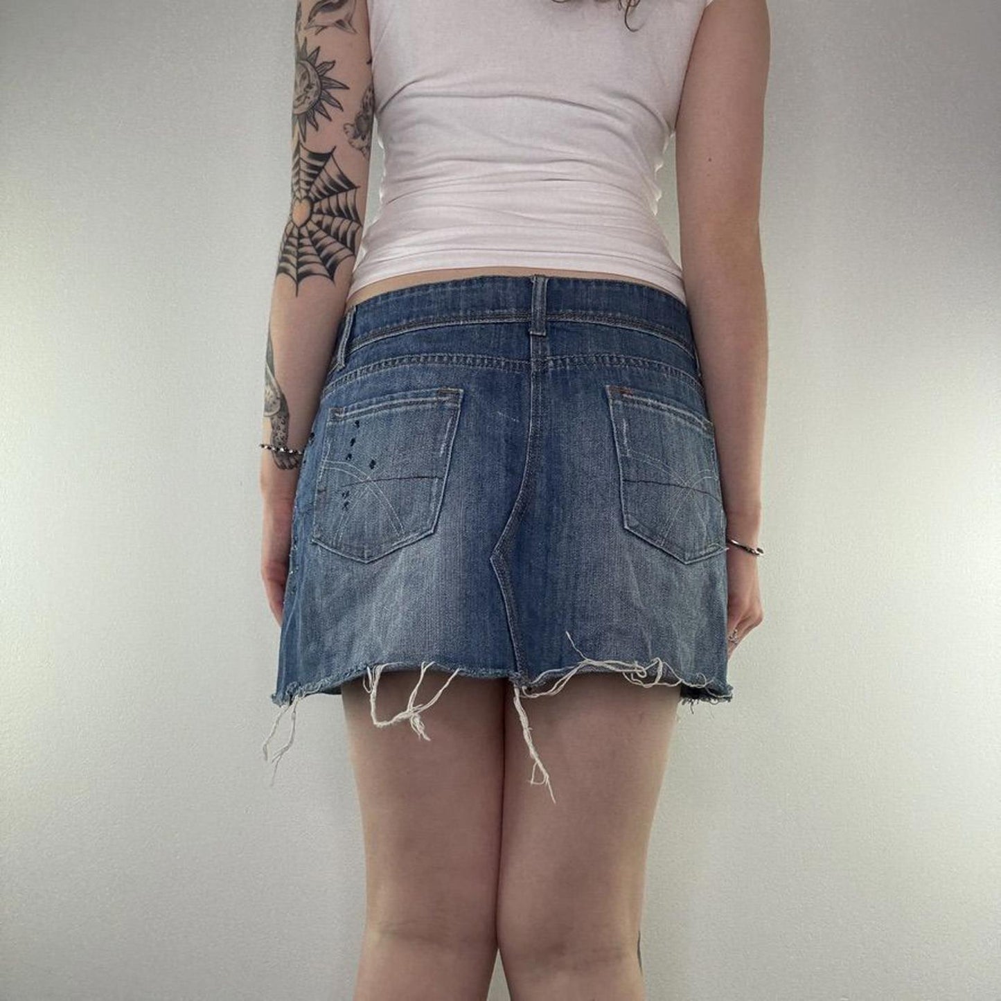 Y2K vintage low rise denim floral embroidery raw fraying hem mini skirt faded