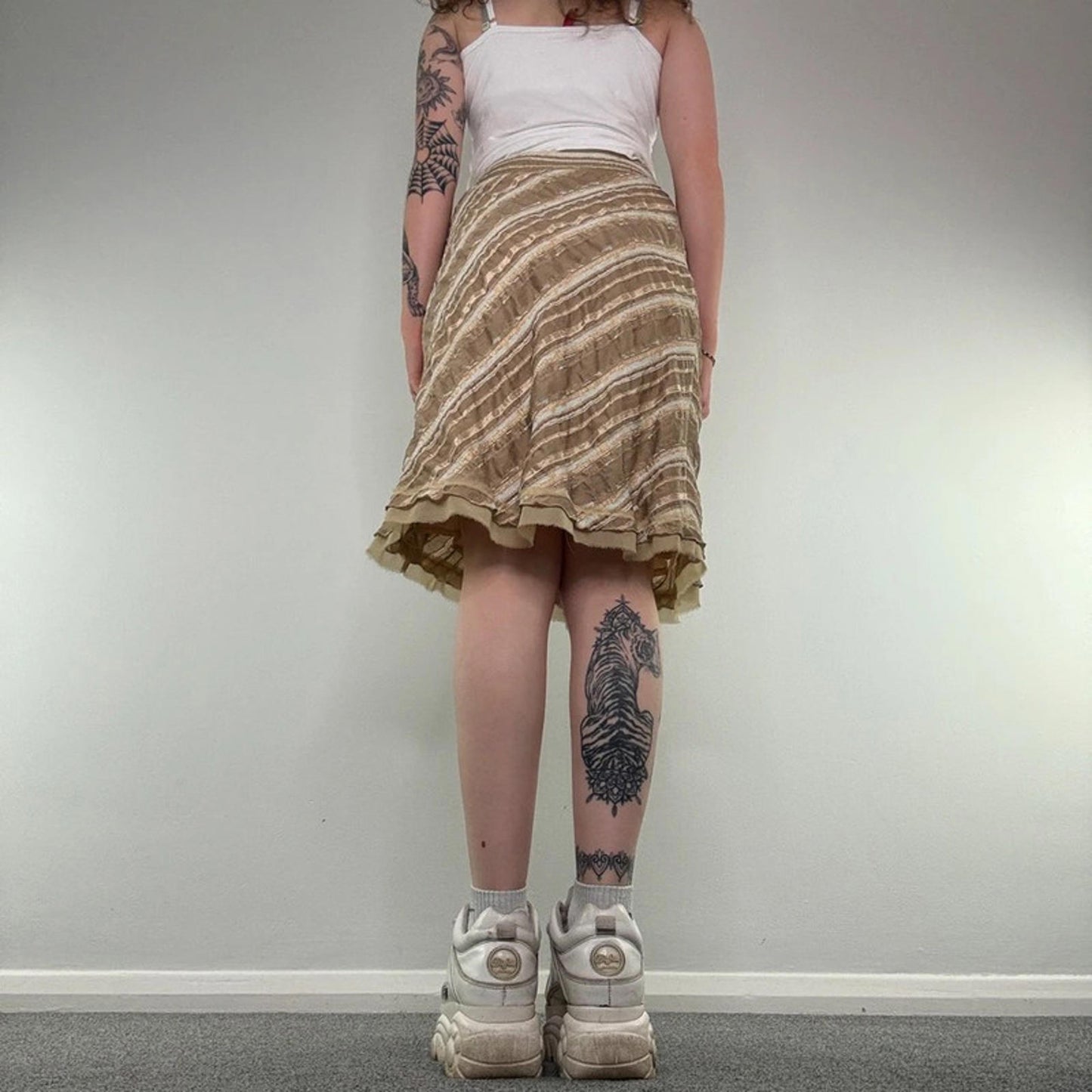 Y2K vintage striped midi skirt gold knee length fraying hem diagonal stripe