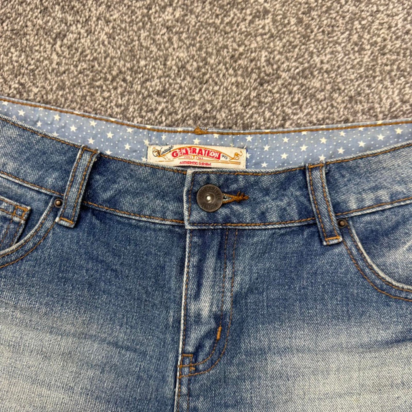 Y2K vintage mid rise denim mini shorts distressed ripped faded fraying hem stars