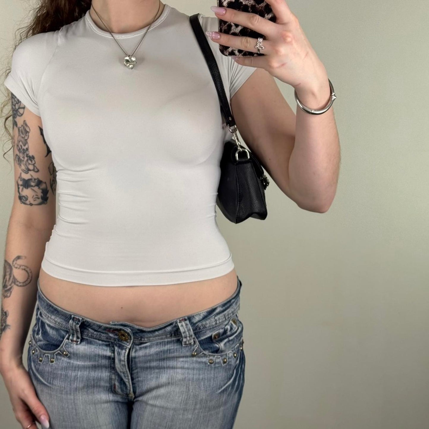 Calvin Klein faux leather mini shoulder bag micro buckle silver black