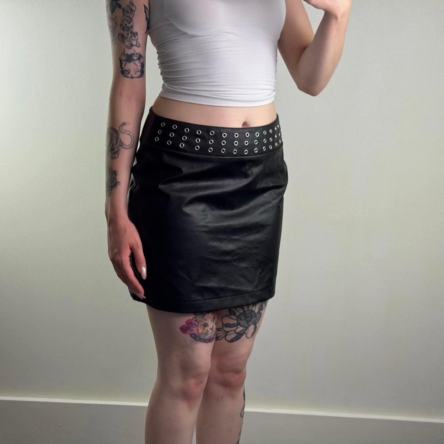 Y2K vintage faux leather studded mini skirt grommet eyelet mid rise alt emo goth