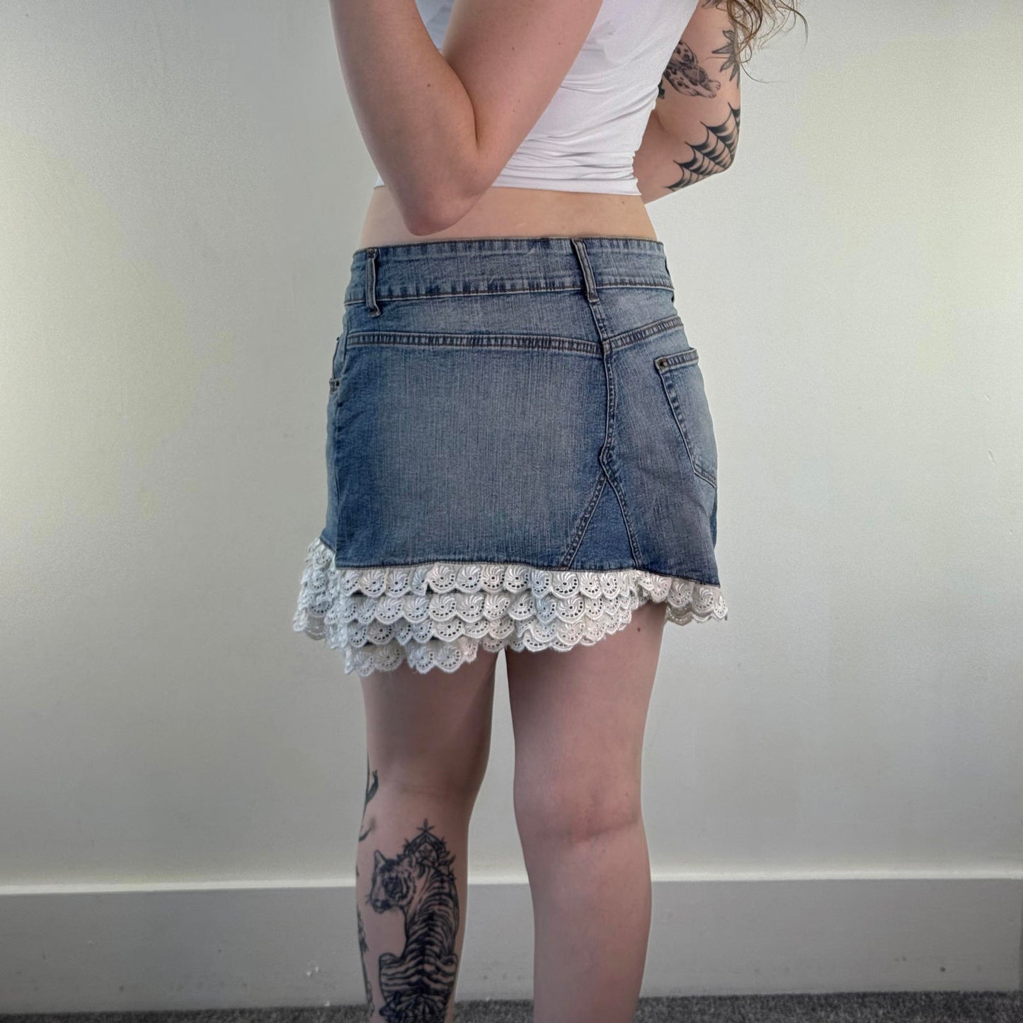 Y2K vintage faded blue denim mini skirt mid rise coquette broderie anglaise trim
