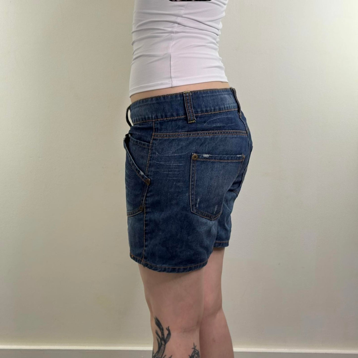 Y2K vintage low rise denim shorts jorts faded blue wash distressed baggy