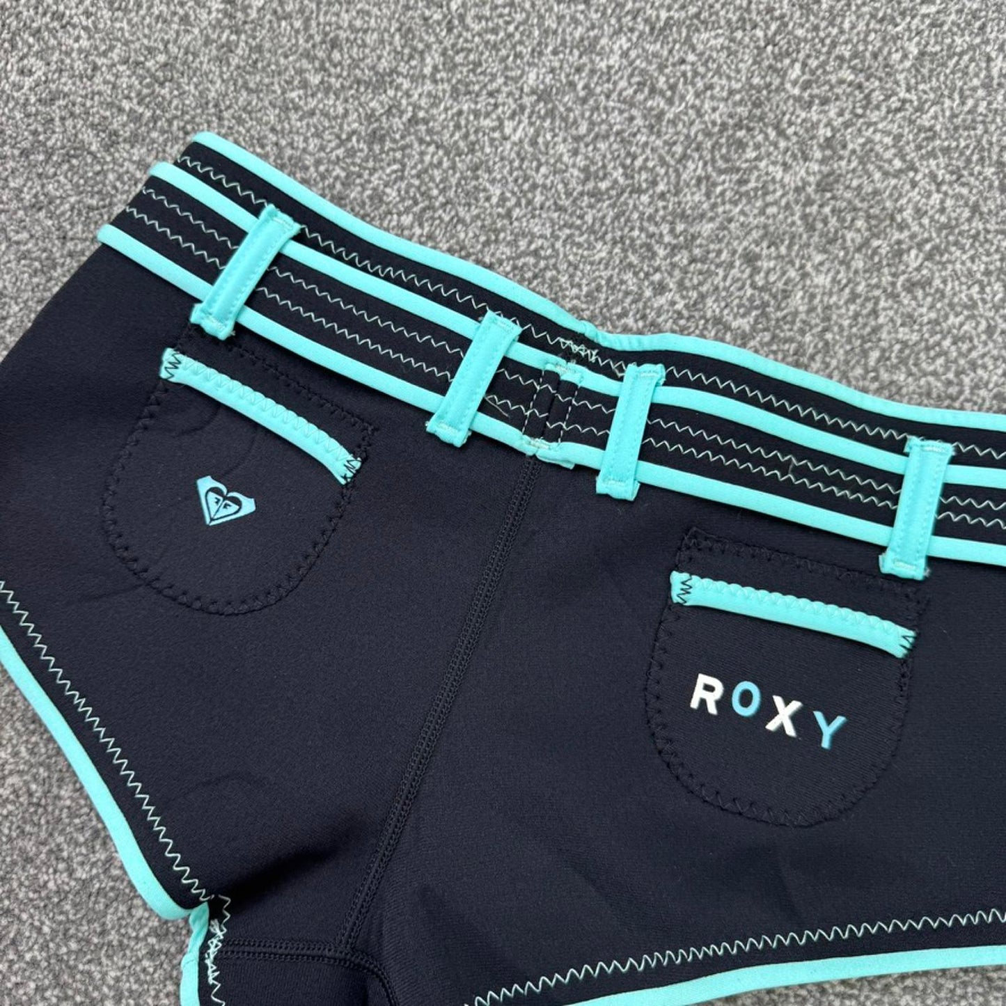 Y2K vintage Roxy hot pant shorts neoprene blend black blue mini