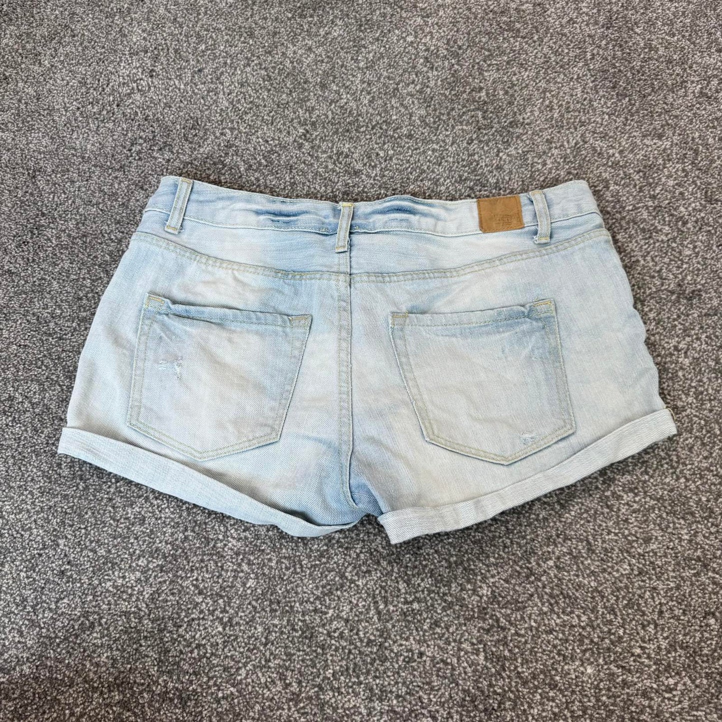 Vintage low rise light blue denim mini shorts distressed contrast stitch