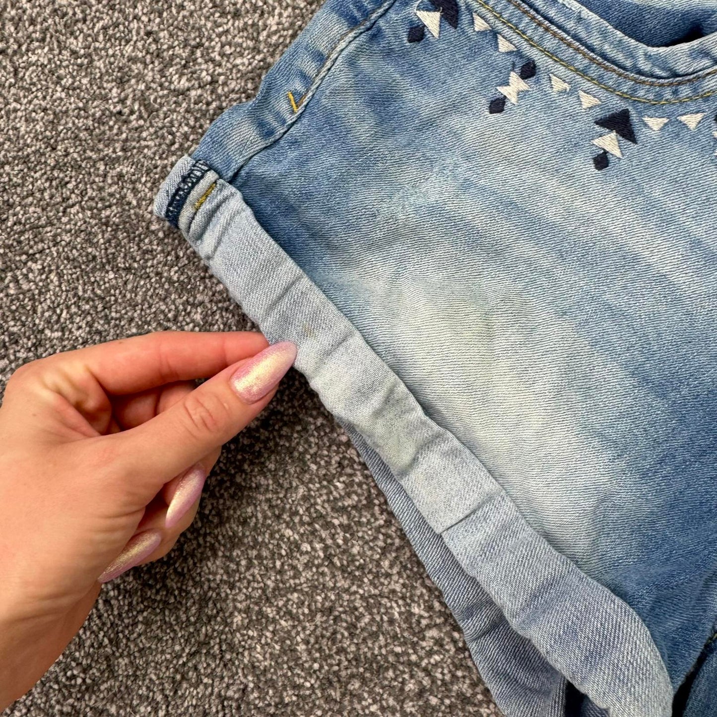 Y2K vintage low rise faded denim mini shorts embroidered aztec 2010s turned hem