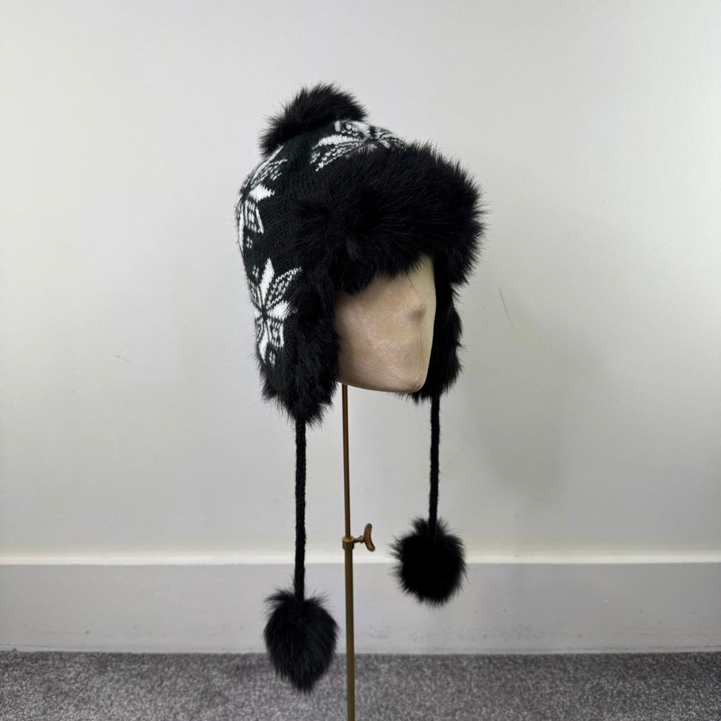 Faux fur lined trapper hat knitted snowflake black white unisex