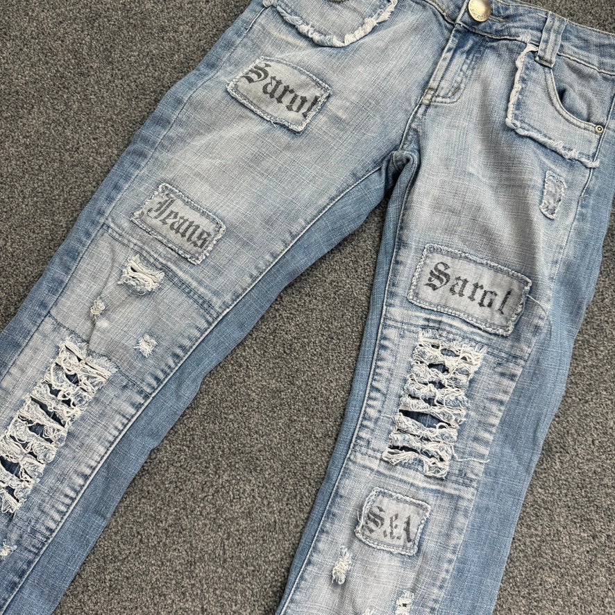 Y2K vintage low rise distressed slogan faded denim bootcut jeans