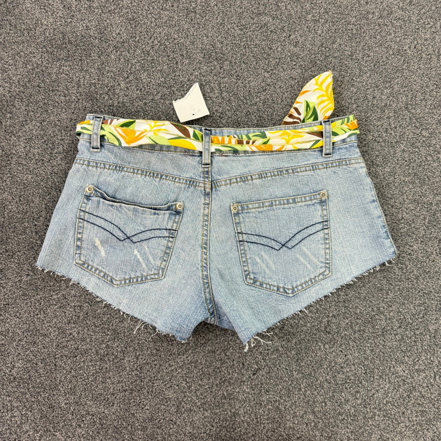 Y2K low rise raw hem mini denim shorts with sunflower tie belt