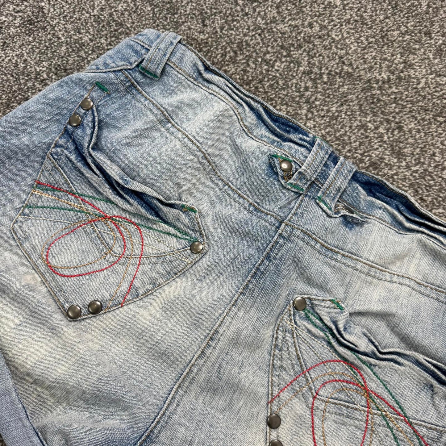 Y2K vintage low rise faded denim mini shorts stretchy turned up hem light blue