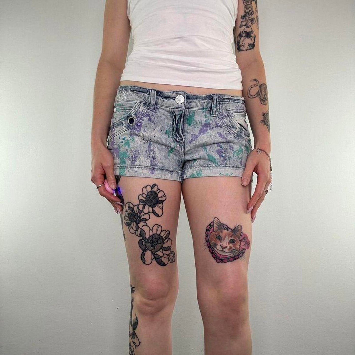 Y2K vintage low rise mini denim shorts paint splattered rhinestone embellished