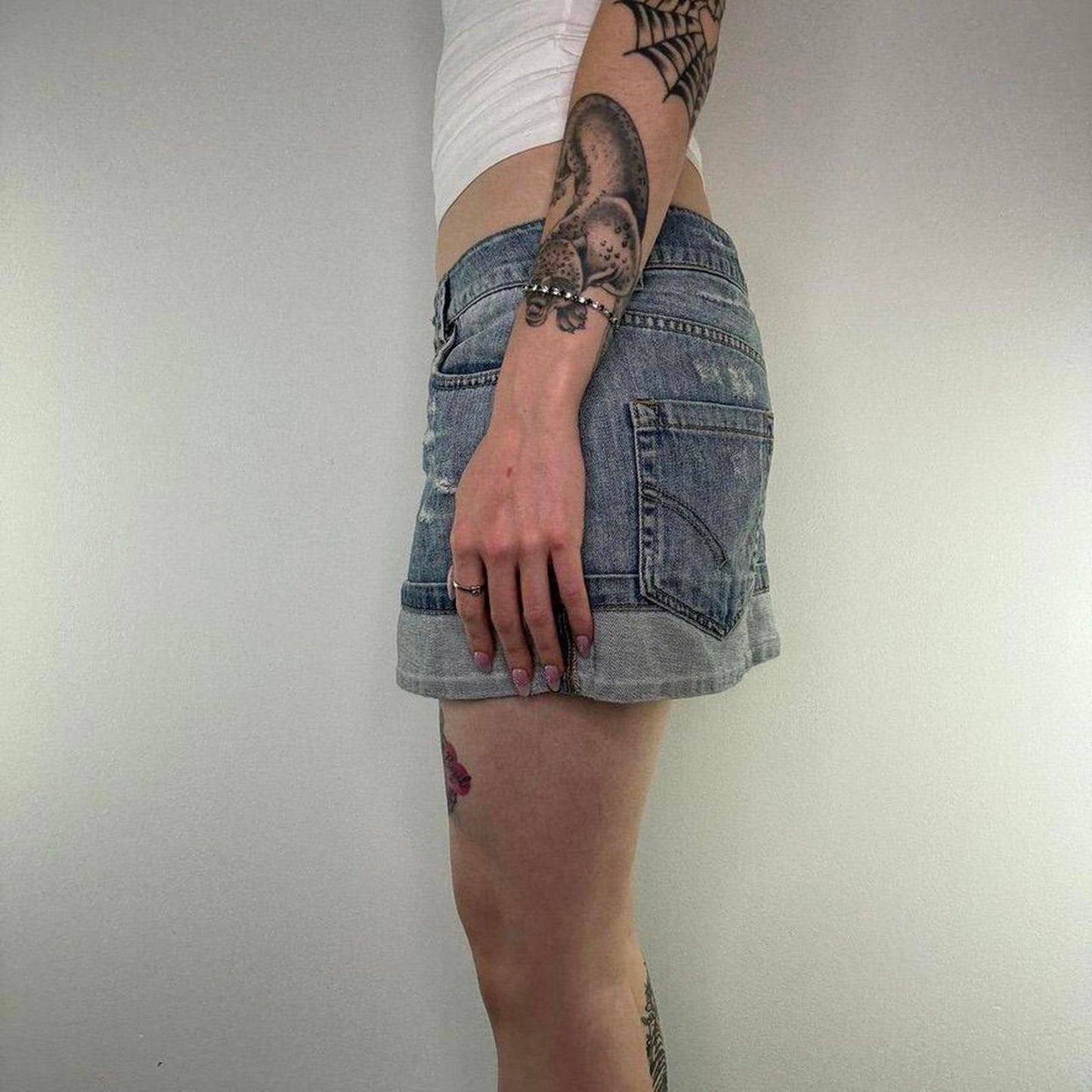 Y2K vintage low rise distressed denim two tone mini skirt light blue wash