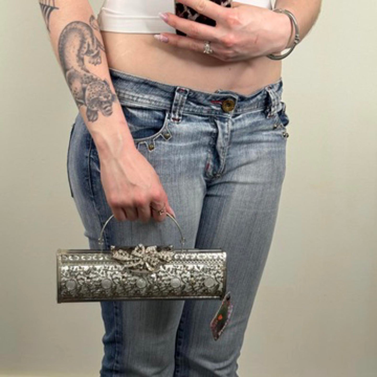 Silver tone ornate metal evening clutch bag with handle baguette long small