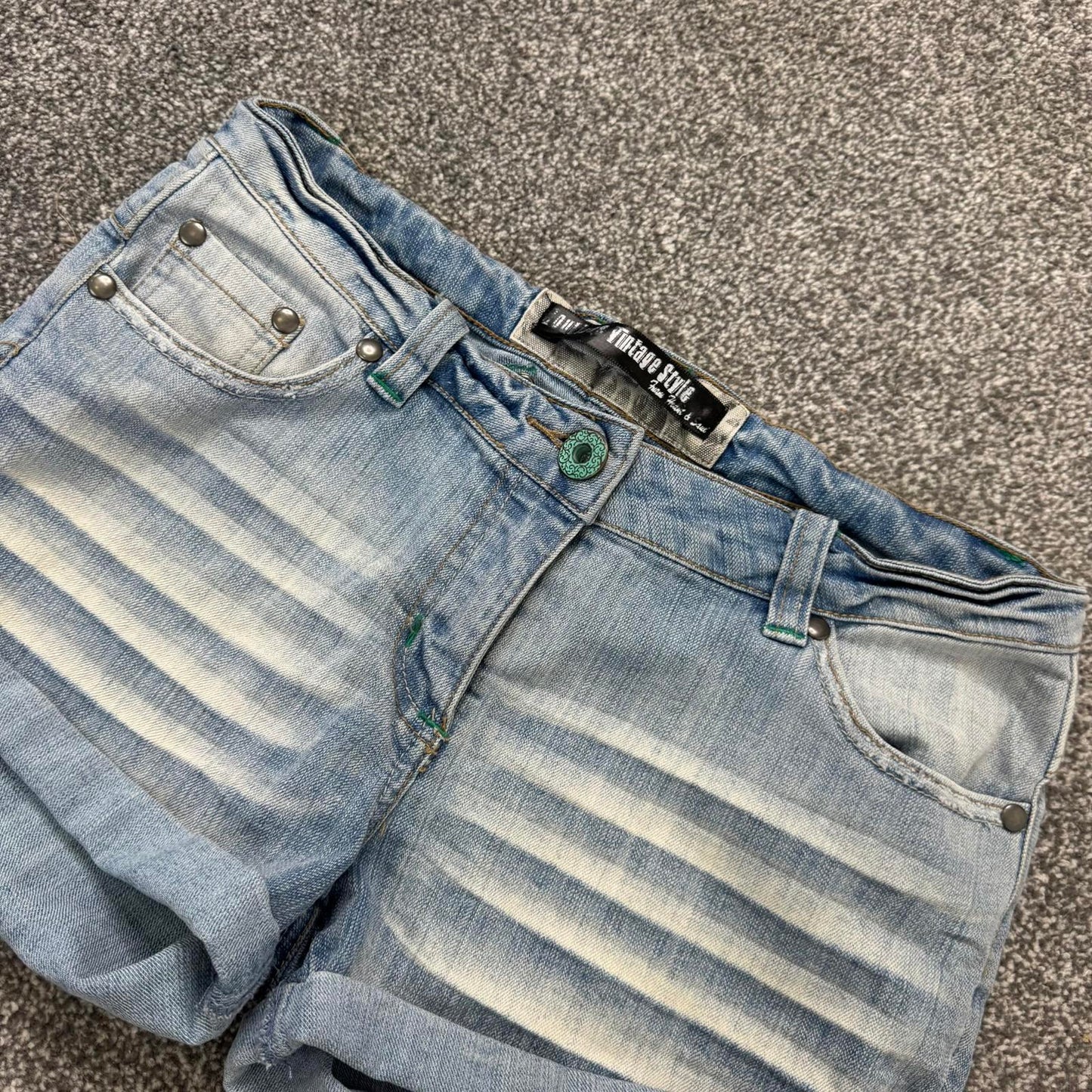 Y2K vintage low rise faded denim mini shorts stretchy turned up hem light blue