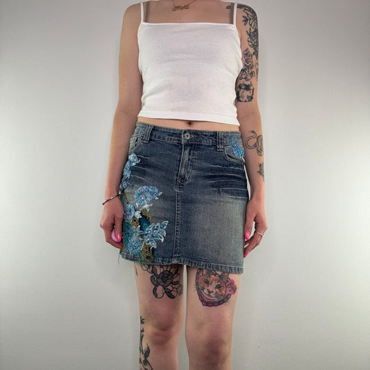 Y2K snake floral faded denim mini skirt