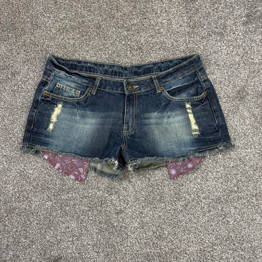 Y2K vintage low rise denim mini shorts distressed fraying hem ripped dark blue