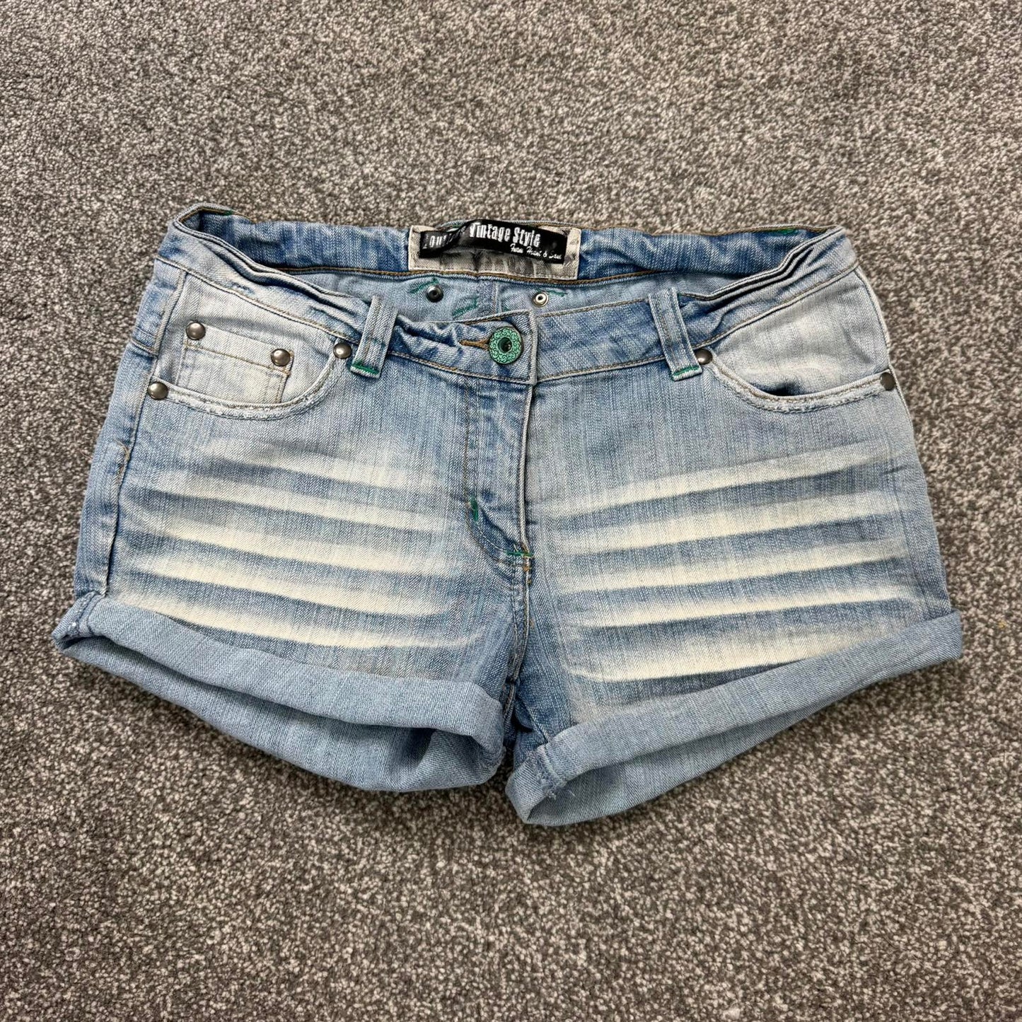 Y2K vintage low rise faded denim mini shorts stretchy turned up hem light blue