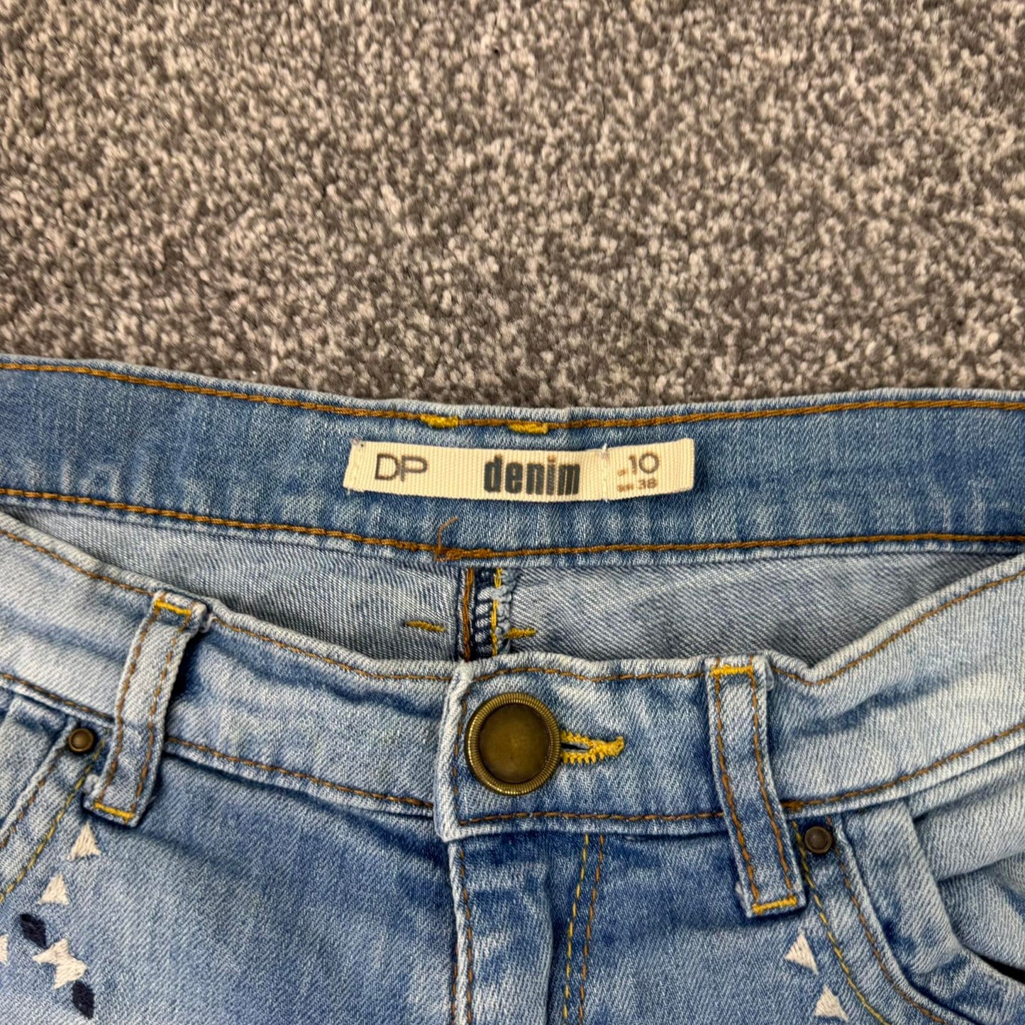 Y2K vintage low rise faded denim mini shorts embroidered aztec 2010s turned hem