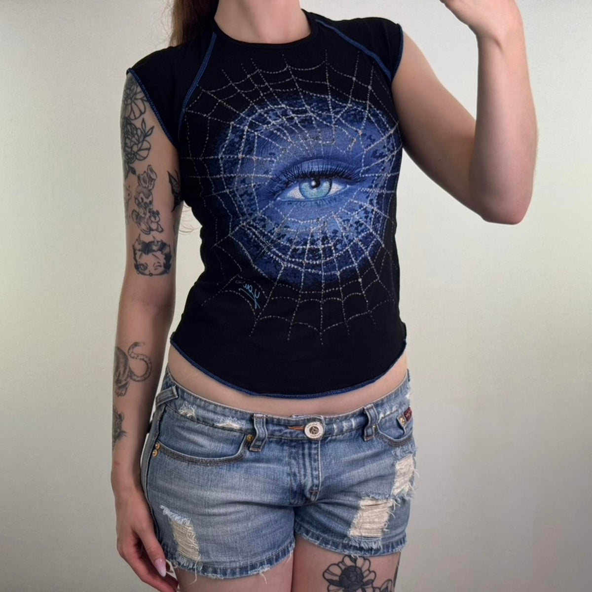 Y2K vintage cap sleeve graphic print t shirt baby tee spiderweb eye curved hem