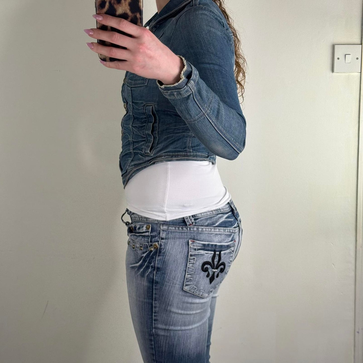 Y2K vintage denim jacket button up curved hem faded blue wash fitted cropped