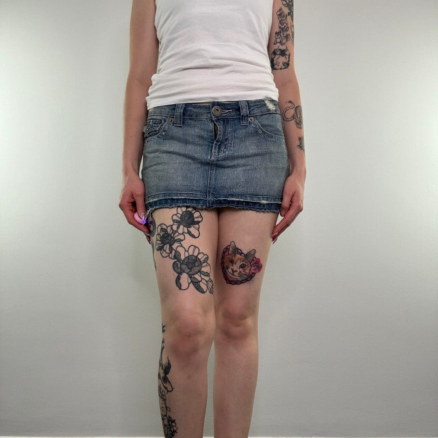 Y2K vintage faded denim distressed low rise mini skirt