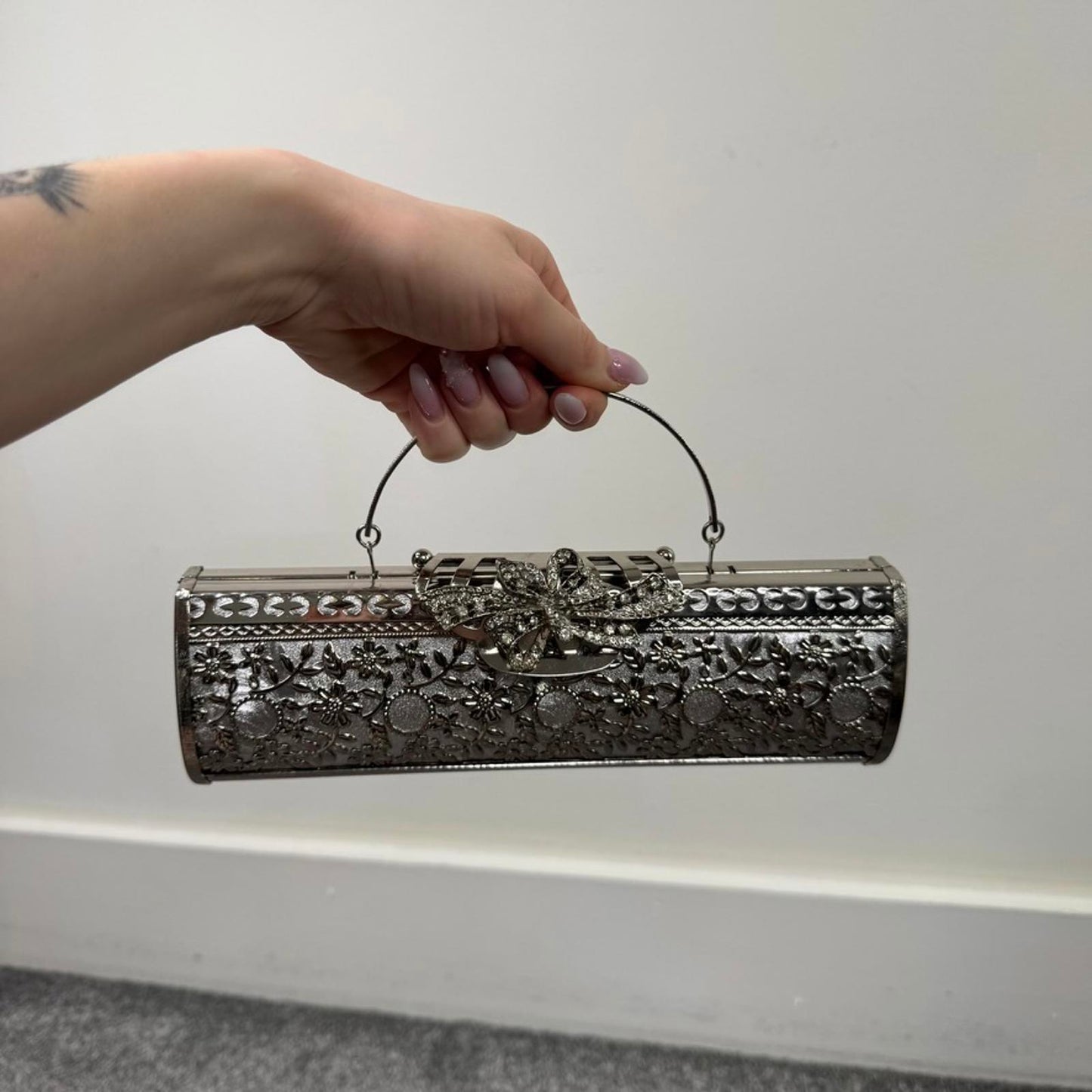 Silver tone ornate metal evening clutch bag with handle baguette long small
