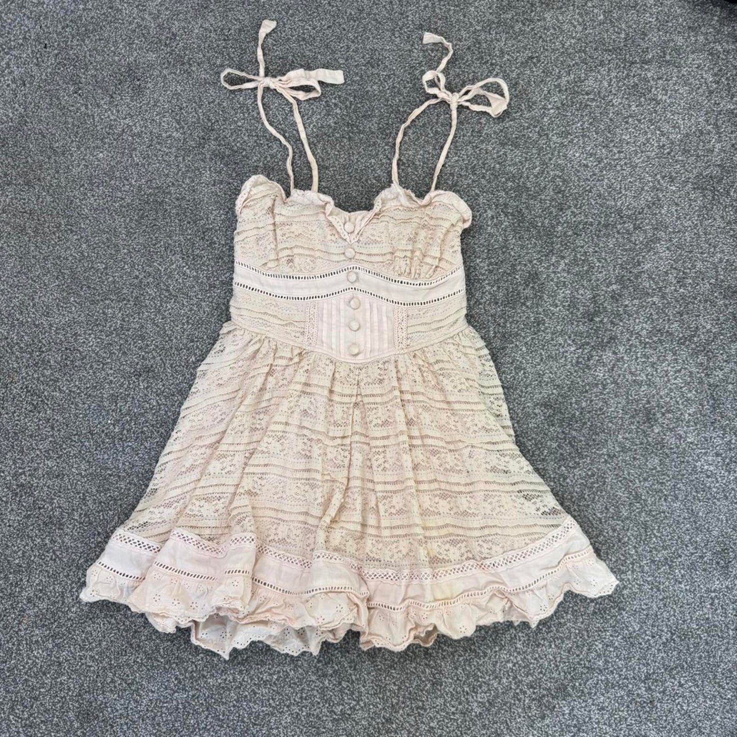 Japanese brand Liz Lisa coquette mini dress bows pink ruffle trim buttons lace