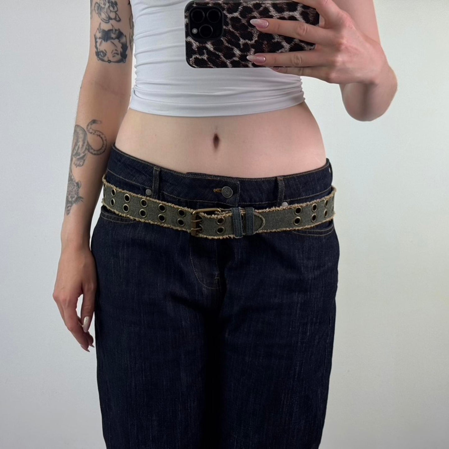 Y2K vintage denim grommet fraying hem belt faux leather lined