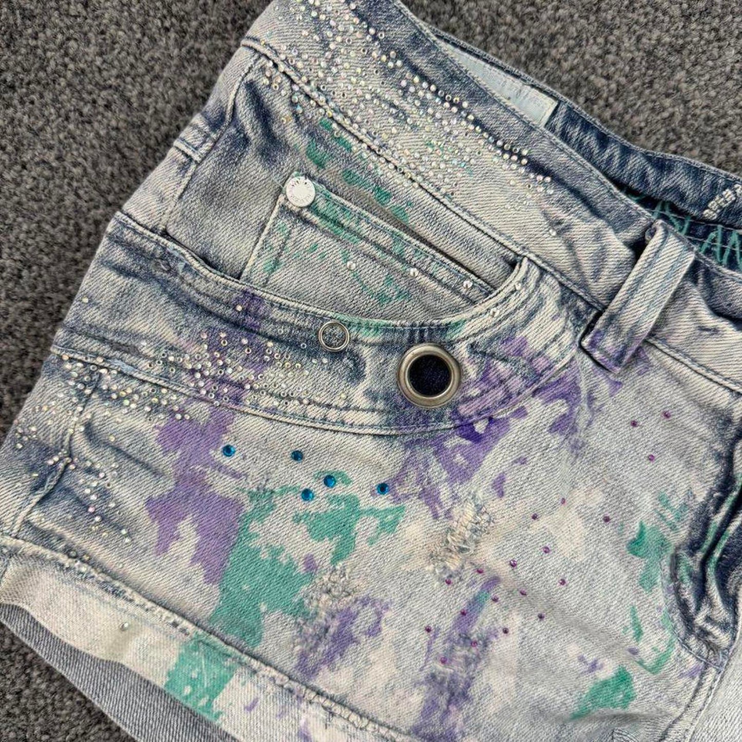 Y2K vintage low rise mini denim shorts paint splattered rhinestone embellished