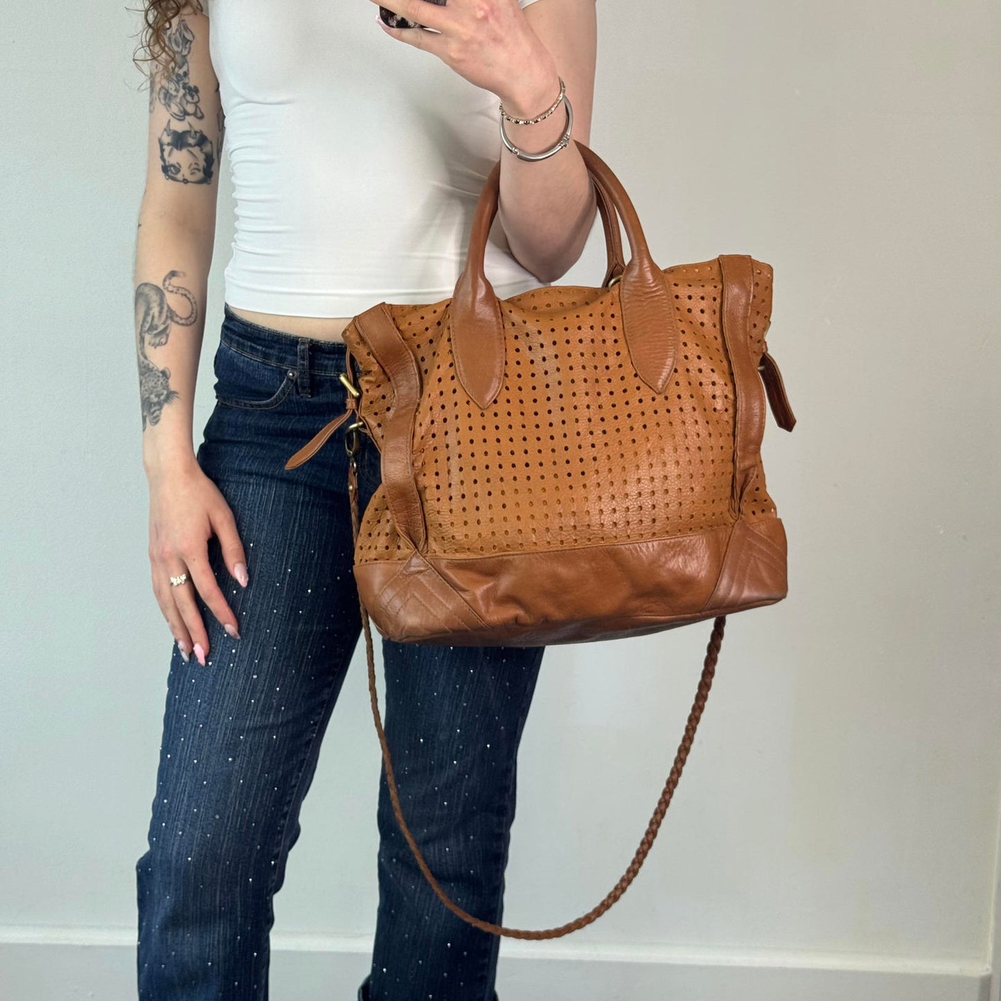 Oversized genuine perforated leather handbag braided strap large buckles boho