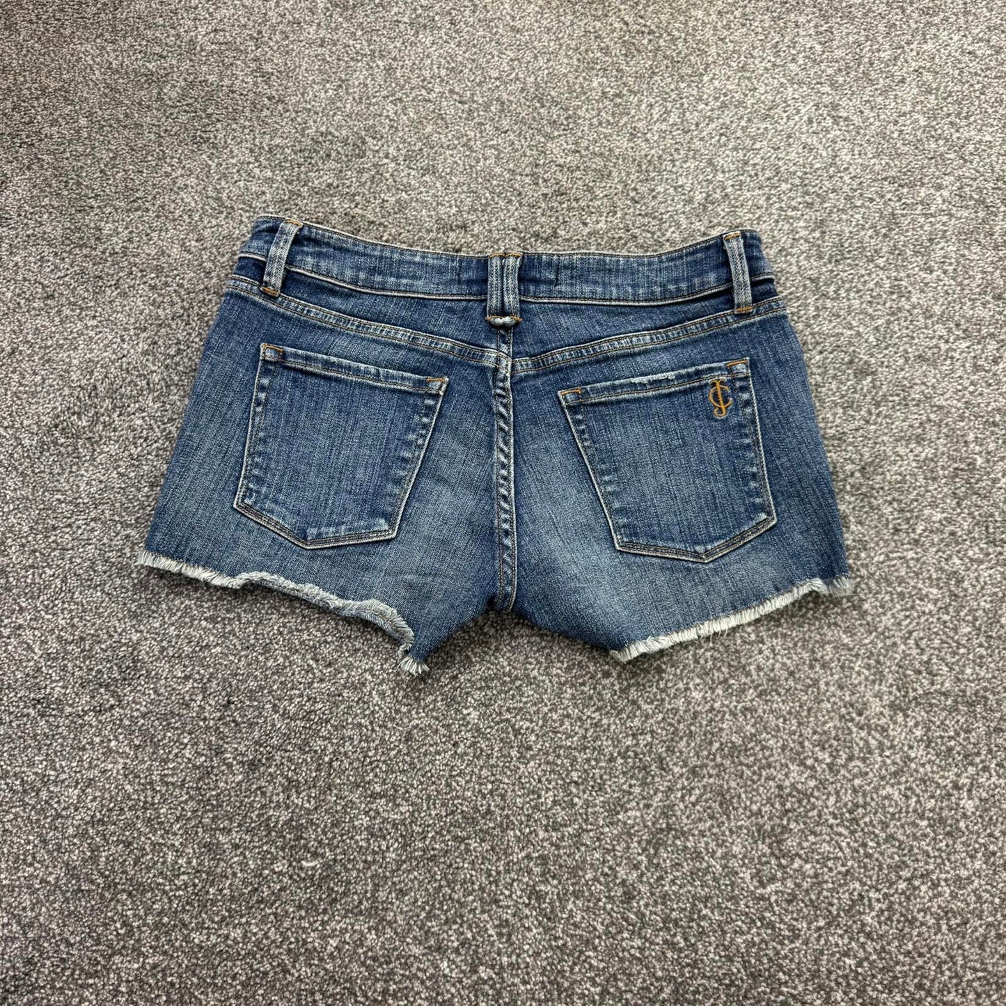 Y2K vintage Juicy Couture low rise denim mini shorts faded fraying hem