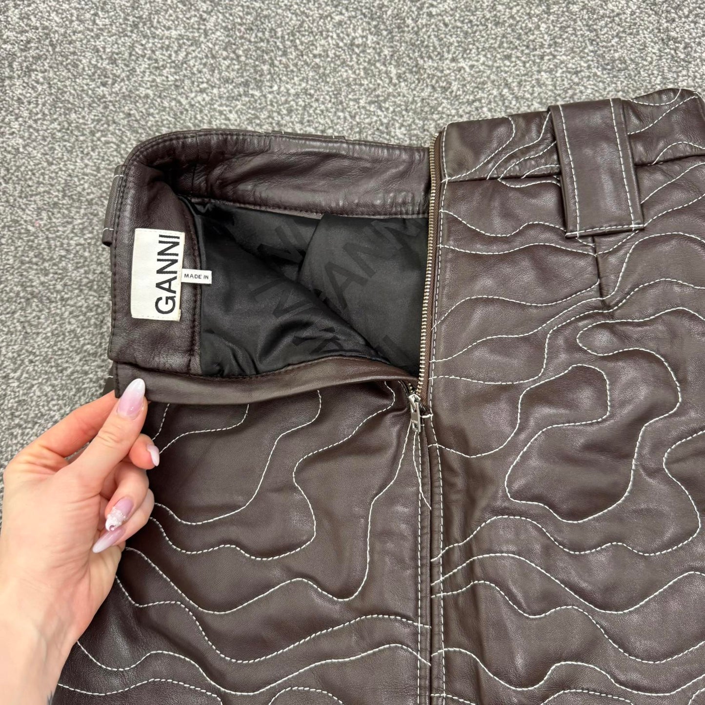 Ganni genuine lamb leather wavy mini skirt brown white pattern