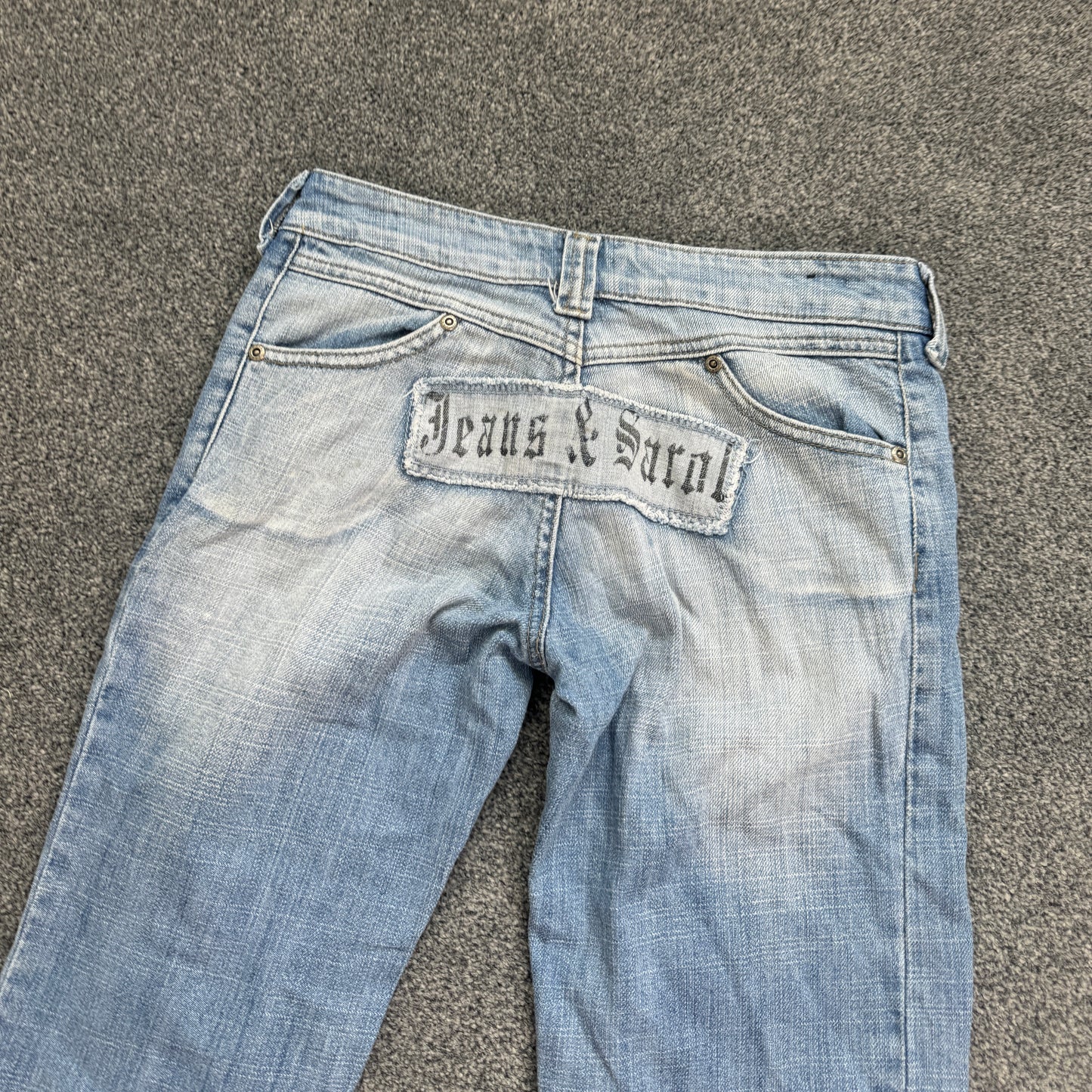 Y2K vintage low rise distressed slogan faded denim bootcut jeans