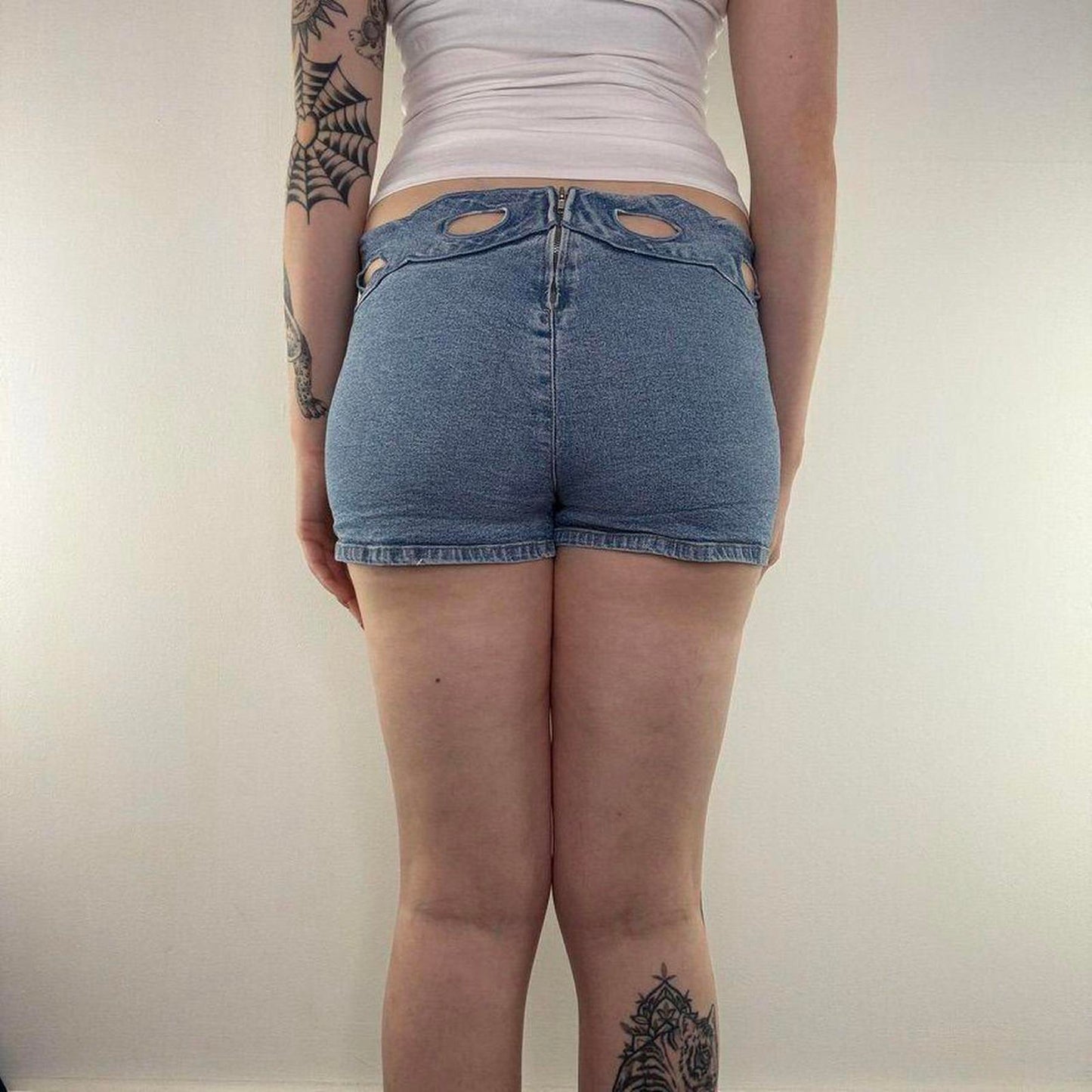 Y2K vintage stretchy denim mini shorts cut out mid rise