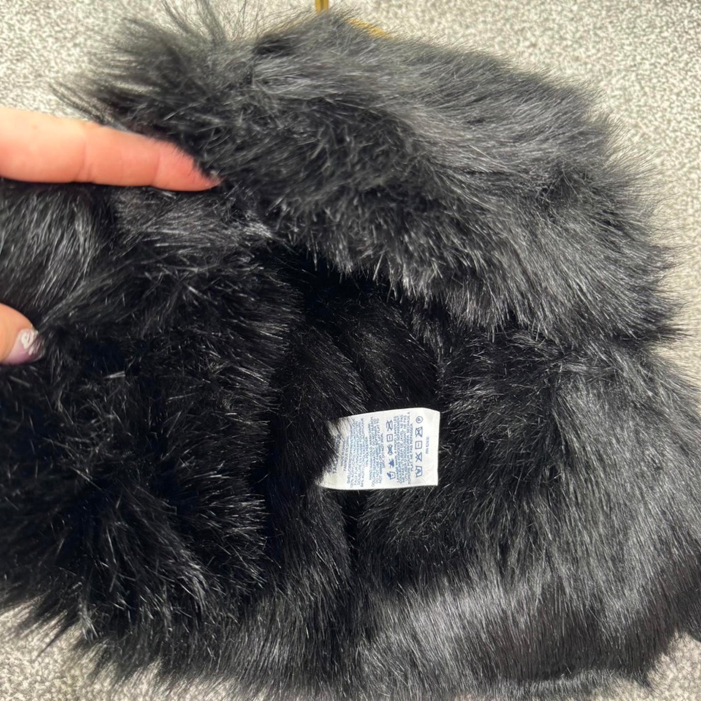 Faux fur lined trapper hat knitted snowflake black white unisex