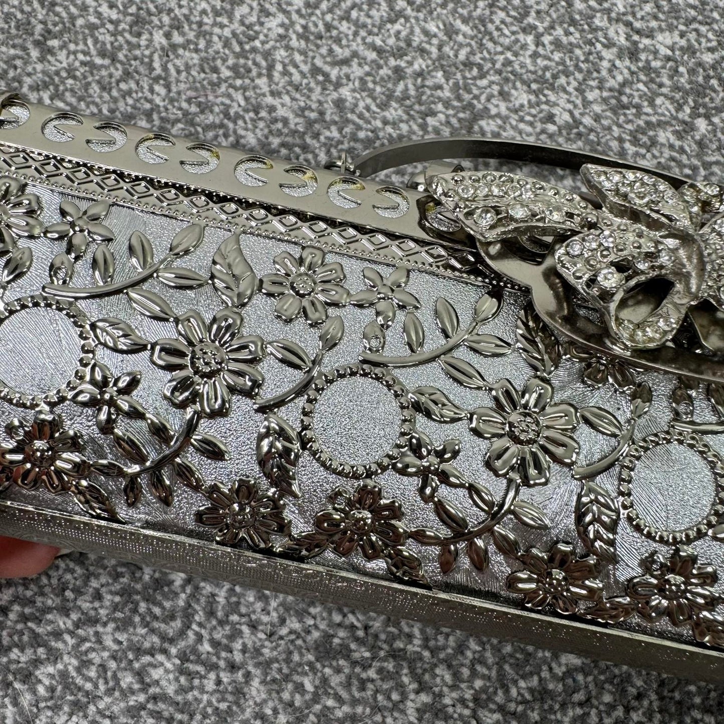 Silver tone ornate metal evening clutch bag with handle baguette long small