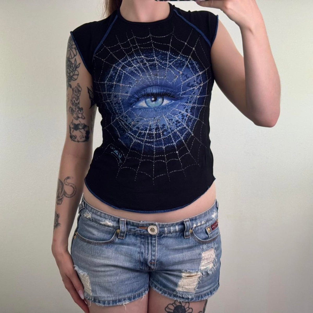 Y2K vintage cap sleeve graphic print t shirt baby tee spiderweb eye curved hem