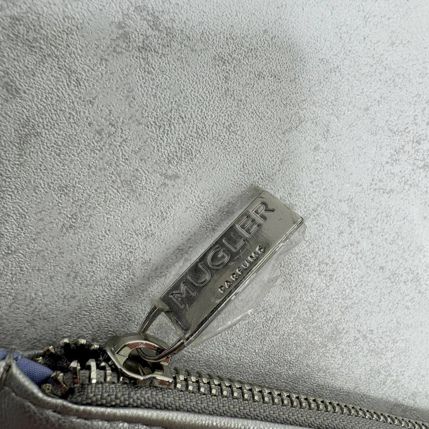 Mugler Parfums large cosmetic bag wash clutch silver grey star faux leather