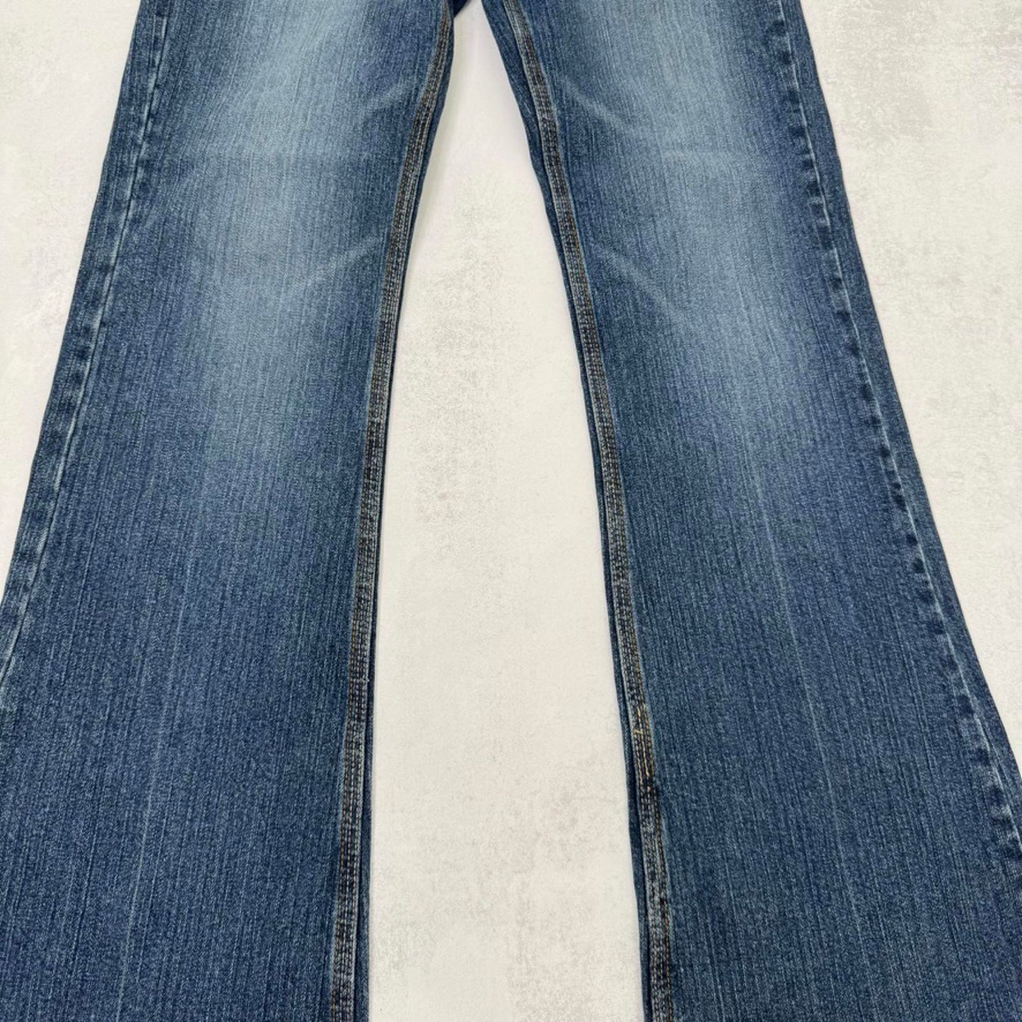 Y2K vintage bootcut denim jeans mid rise stretchy faded mid blue wash