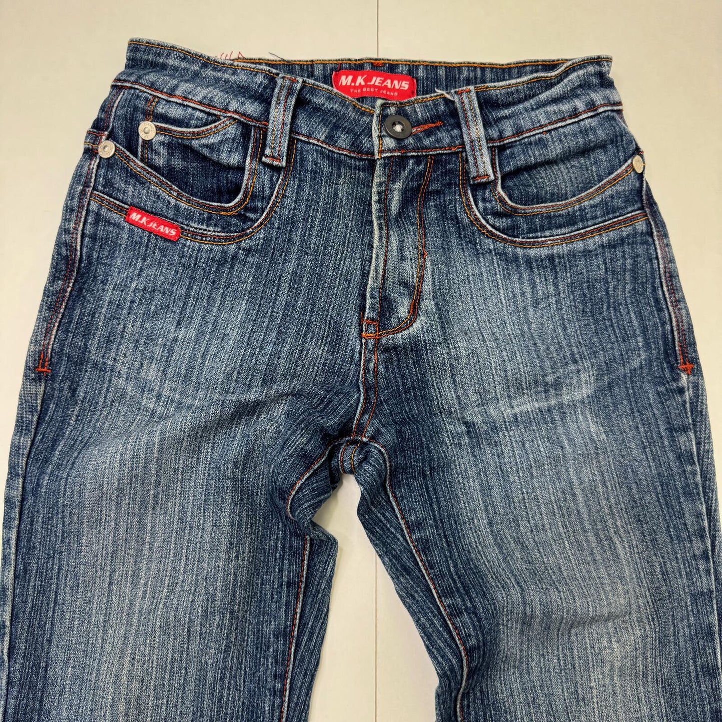 Y2K vintage bootcut denim jeans stretchy cargo pockets contrast stitch faded mid