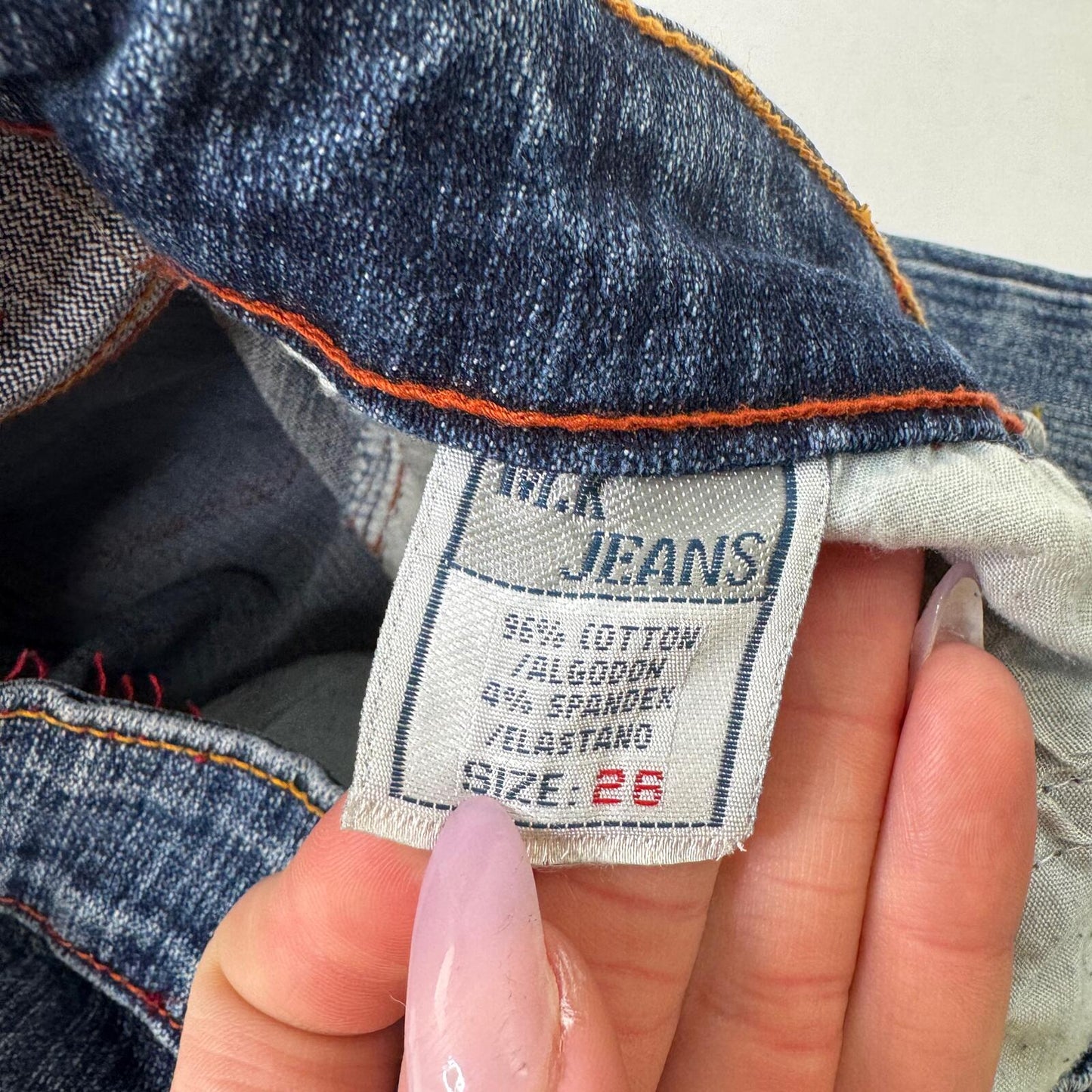 Y2K vintage bootcut denim jeans stretchy cargo pockets contrast stitch faded mid