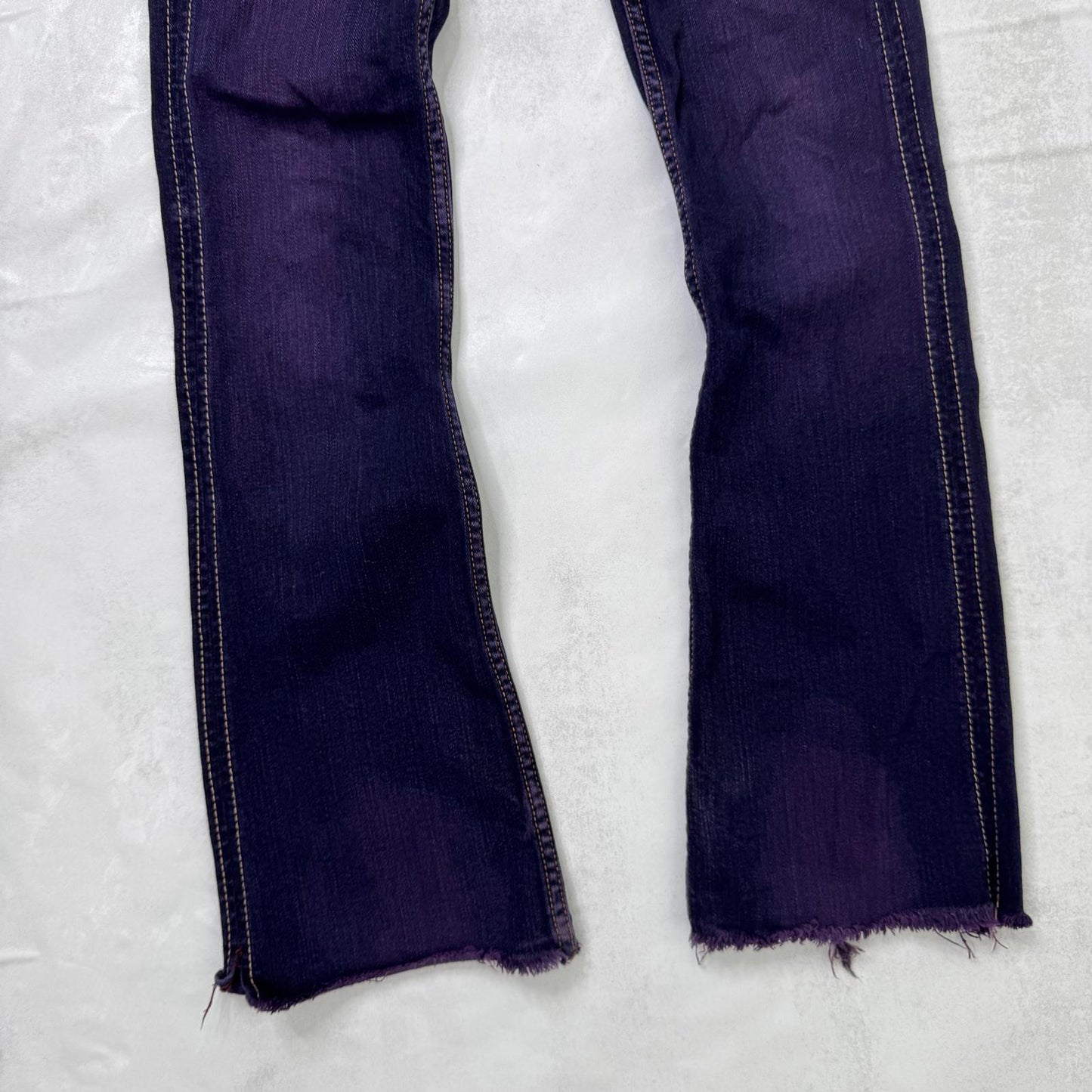 Y2K vintage low rise bootcut denim jeans stretchy purple faded wash fraying hem