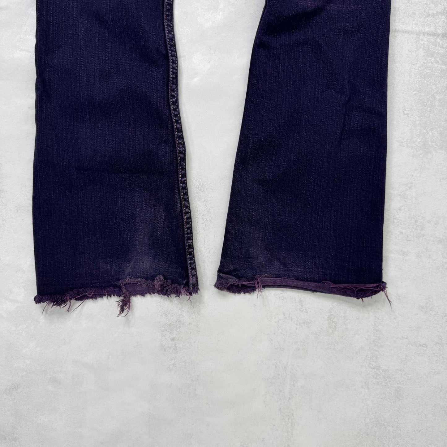 Y2K vintage low rise bootcut denim jeans stretchy purple faded wash fraying hem