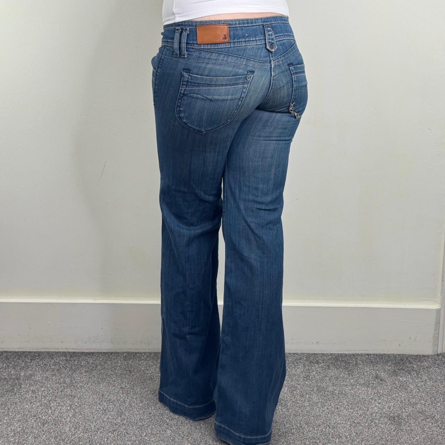 Y2K vintage bootcut denim jeans low rise stretchy light blue faded wash
